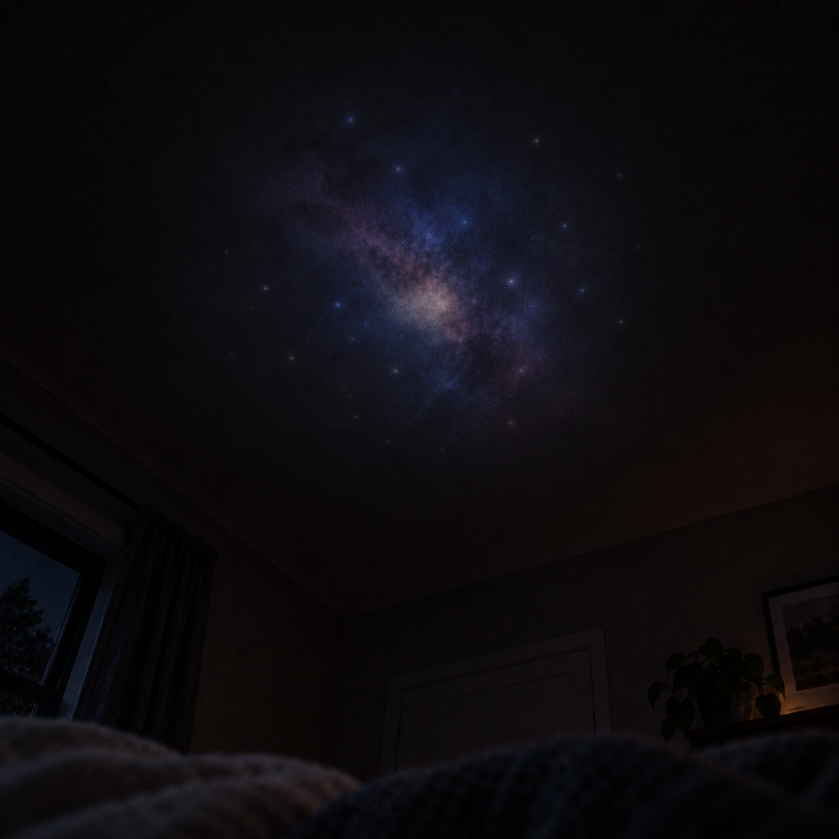 A soft nebula glow projected onto a dark bedroom ceiling